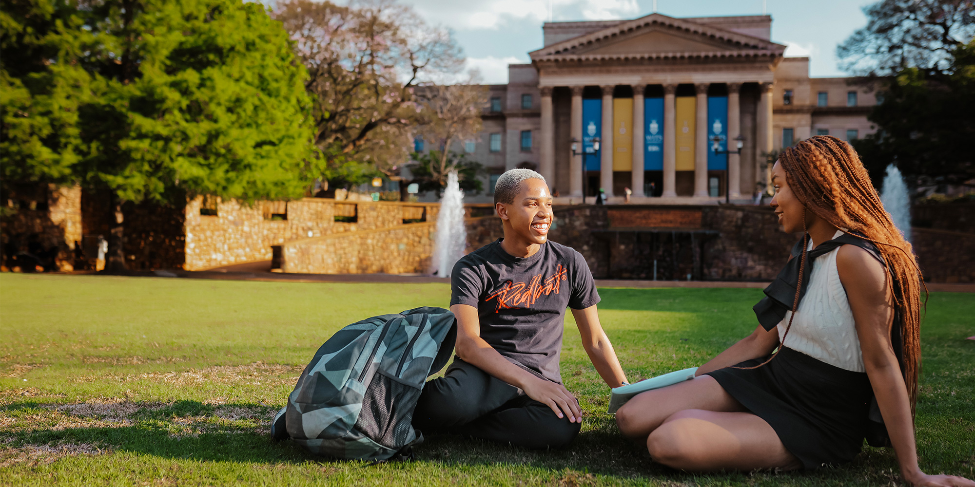 Two students on the Wits Library Lawns